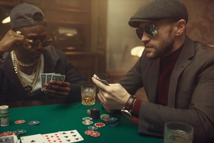 AduQ card game table at sidney mohede showing dealer and player cards